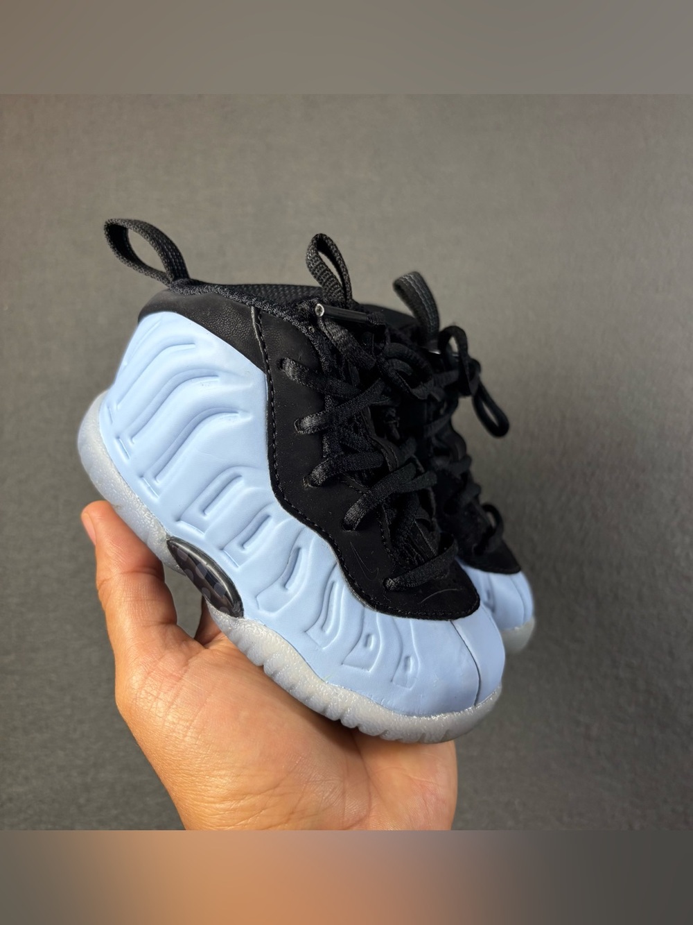 Nike Air Foamposite One black trainers. Size 5C